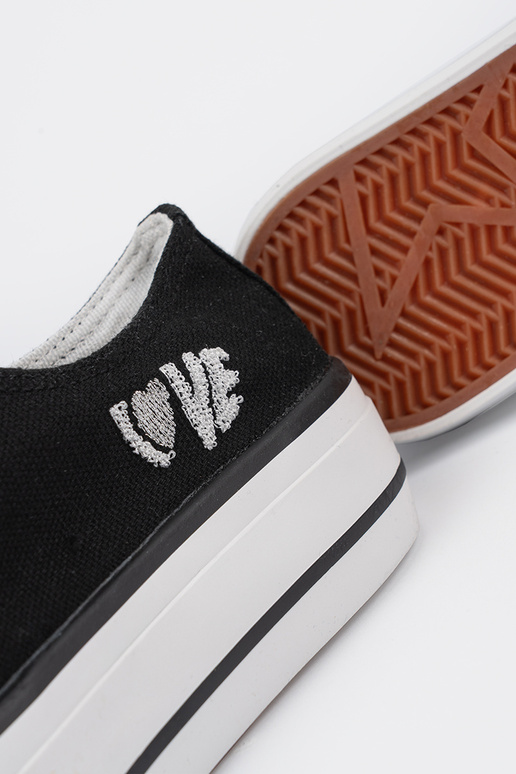 Zapatillas de mujer color negro con... Zapatillas de mujer color negro con...