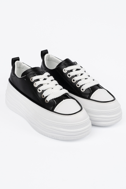 Zapatos de ocio en blanco y negro con... Zapatos de ocio en blanco y negro con...