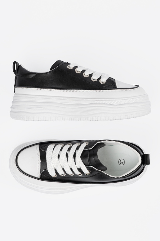 Zapatos de ocio en blanco y negro con... Zapatos de ocio en blanco y negro con...