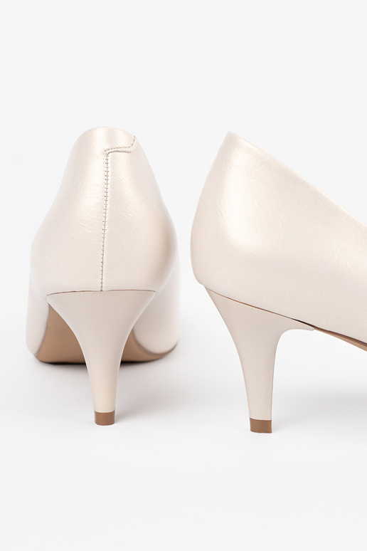 Tacones color marfil, Sergio Leone