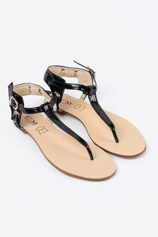 Sandalias planas negras de estilo... Sandalias planas negras de estilo...