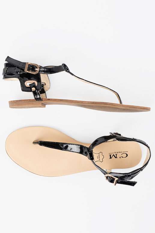 Sandalias planas negras de estilo... Sandalias planas negras de estilo...