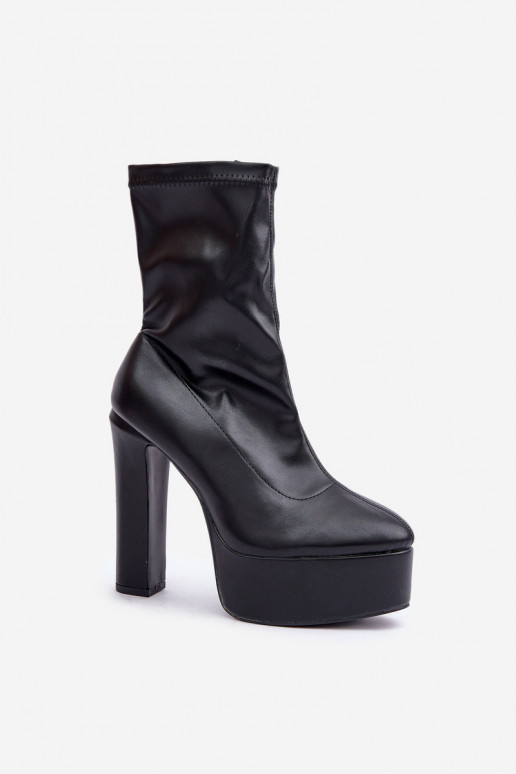 Botas En tacones altos Registro y plataforma de color negro Tennira Botas En tacones altos Registro y plataforma de color negro Tennira