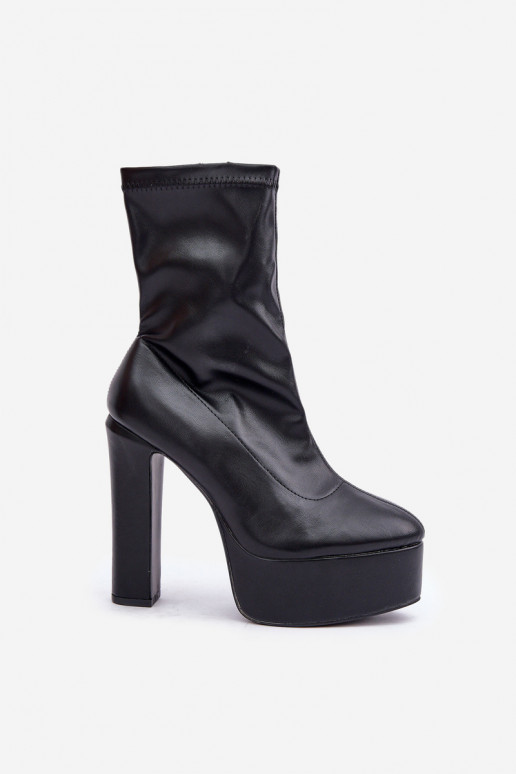 Botas En tacones altos Registro y plataforma de color negro Tennira Botas En tacones altos Registro y plataforma de color negro Tennira