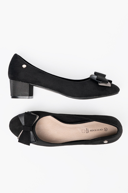 de color negro tacones altos con un arco en el talon de color negro tacones altos con un arco en el talon