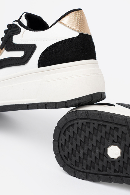 Negro y el color blanco Zapatillas modelo zapatos. ze doradomi detalami