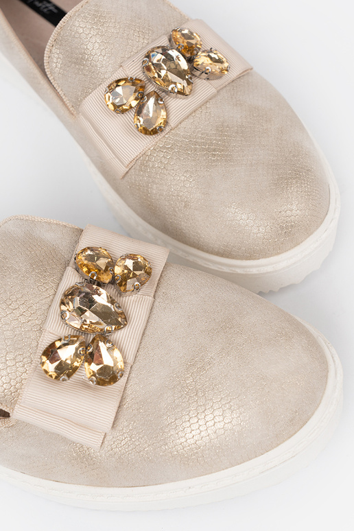 color dorado mocasines z biżuteryjnym detalem na przodzie