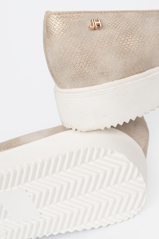 color dorado mocasines z biżuteryjnym detalem na przodzie