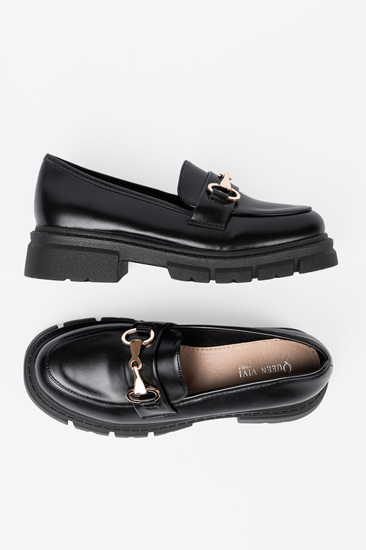 modelo clásico de color negro mocasines z metaloAą klamrą