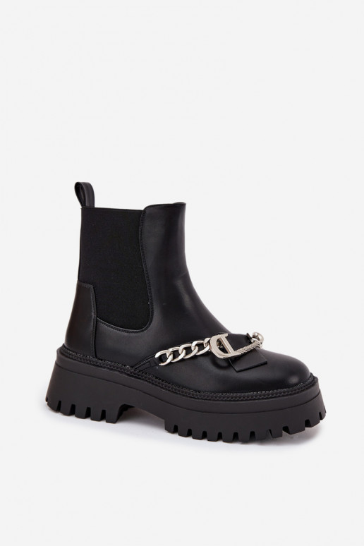 Botas de mujer con una plataforma con cadenas de color negro Tiene quervella