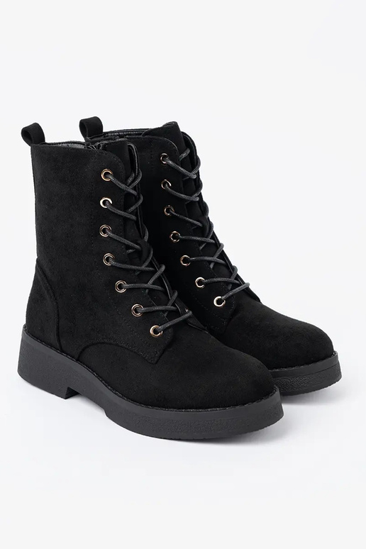 Conveniente botas altas de montar A kolorze de color negrom en una suela plana