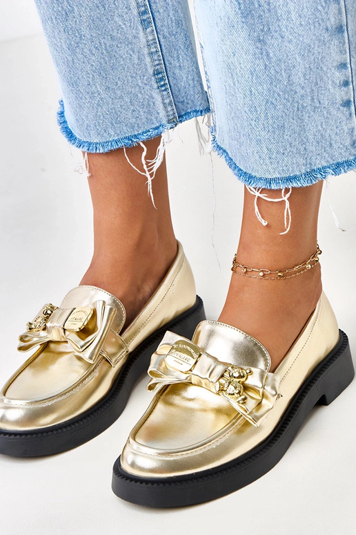 Mocasines dorados con lazo y osito...