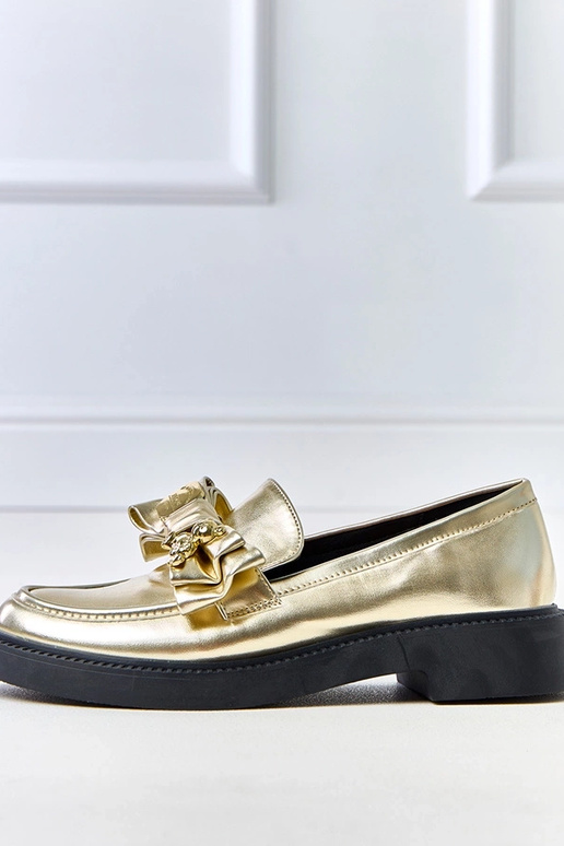 Mocasines dorados con lazo y osito...