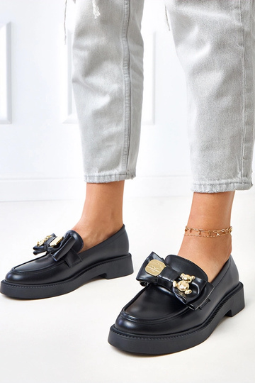 Mocasines negros con lazo y...