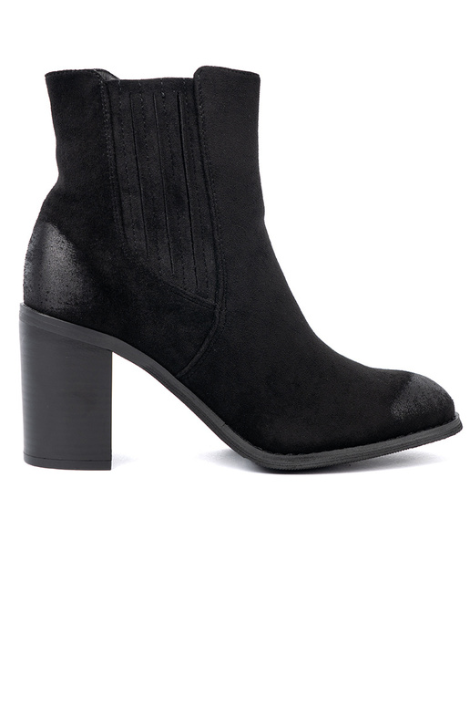 de color negro de gamuza zapatos en un poste alto aislar