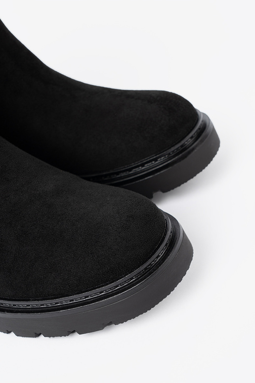 de color negro zapatos sobre una suela gruesa z choleAką en el tobillo