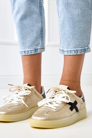 Zapatillas deportivas doradas con plataforma y detalle negro Eriksen