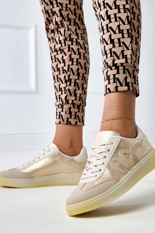 Zapatillas deportivas color arena con...