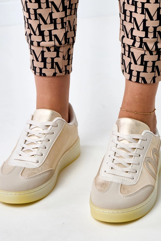 Zapatillas deportivas color arena con...