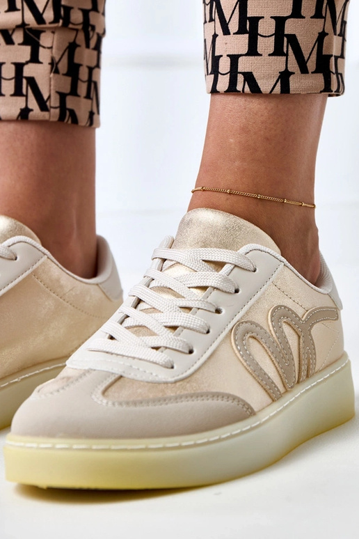 Zapatillas deportivas color arena con...