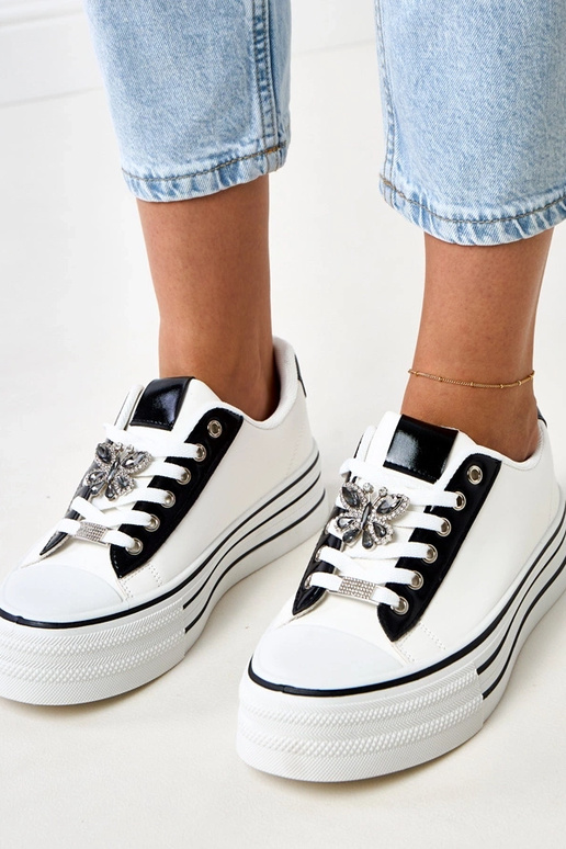 Zapatillas deportivas blancas con... Zapatillas deportivas blancas con...