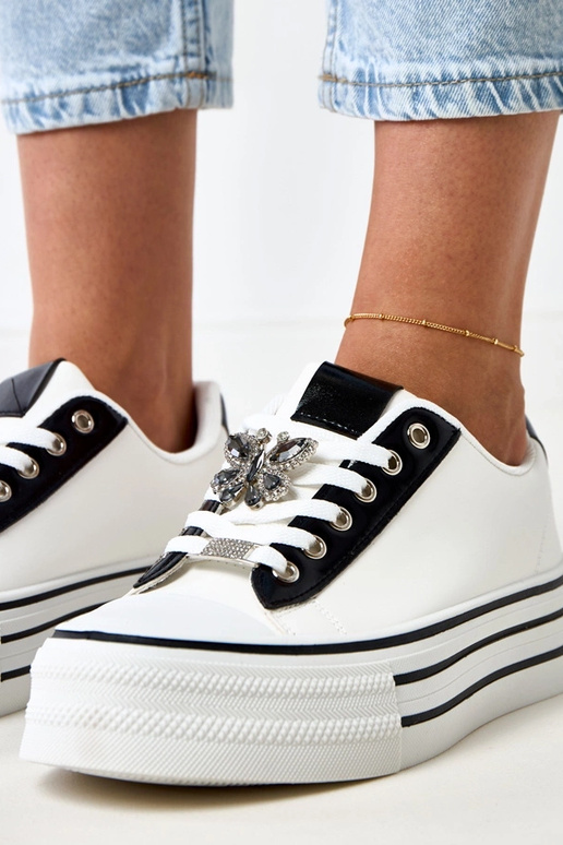 Zapatillas deportivas blancas con... Zapatillas deportivas blancas con...