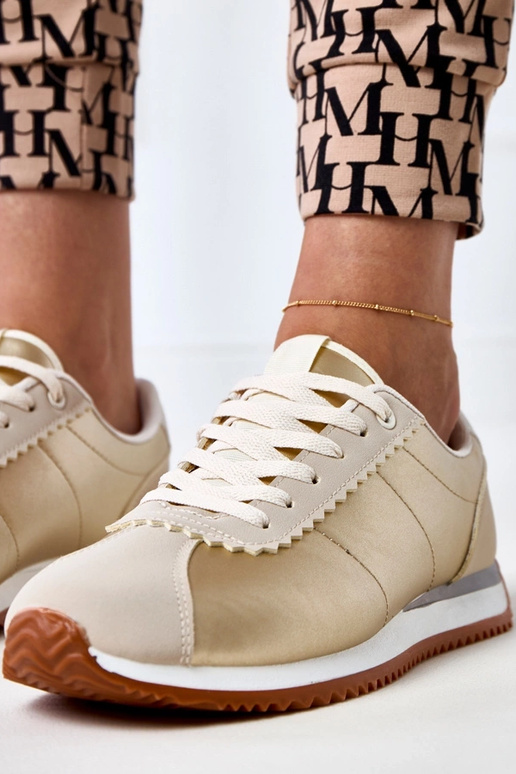 Zapatillas deportivas color arena con...