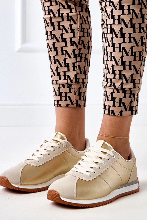 Zapatillas deportivas color arena con...