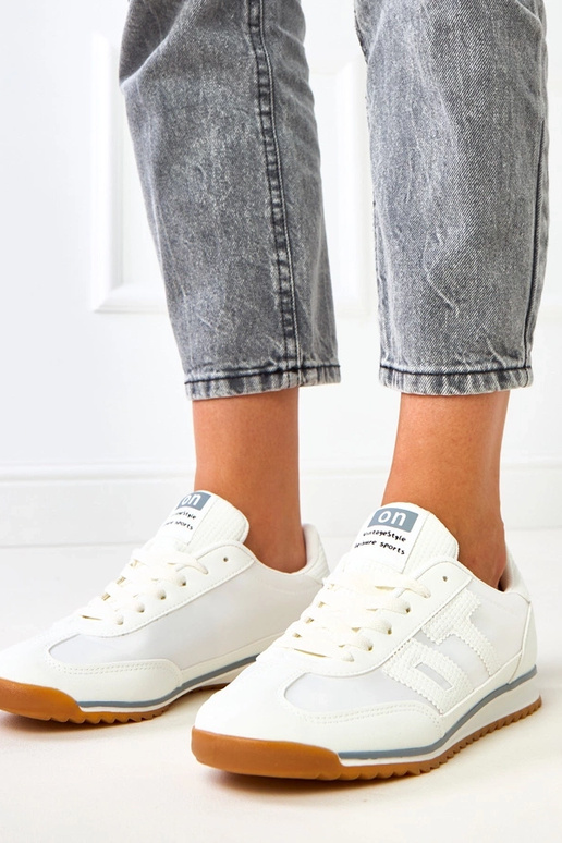 Zapatillas deportivas blancas con... Zapatillas deportivas blancas con...