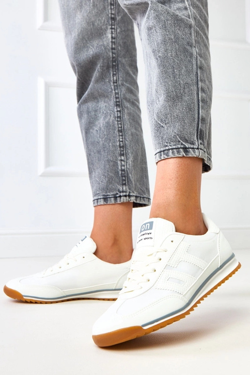 Zapatillas deportivas blancas con... Zapatillas deportivas blancas con...