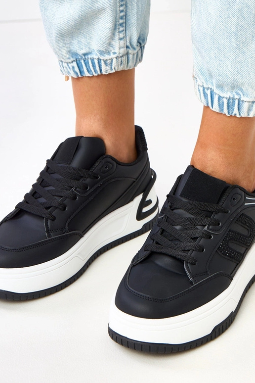 Zapatillas deportivas negras con... Zapatillas deportivas negras con...