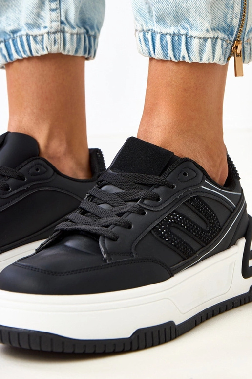 Zapatillas deportivas negras con... Zapatillas deportivas negras con...