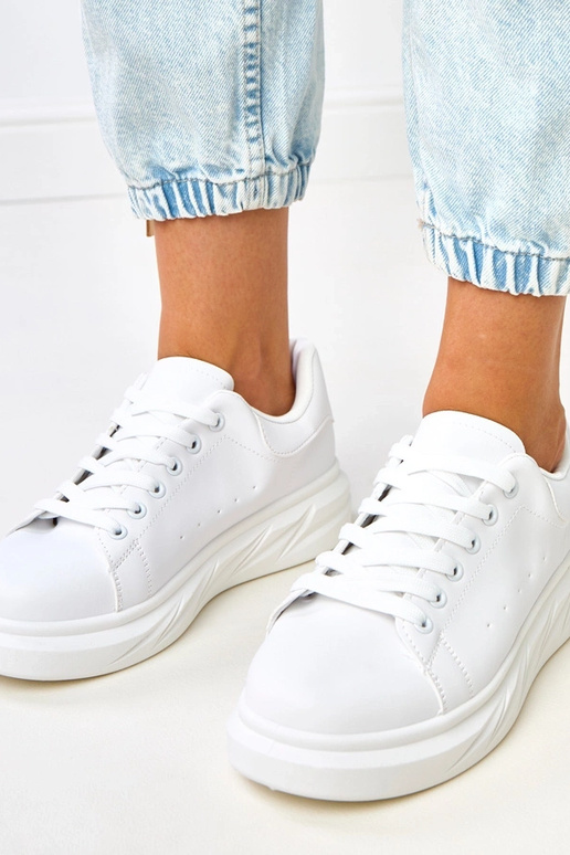 Zapatillas deportivas blancas con... Zapatillas deportivas blancas con...