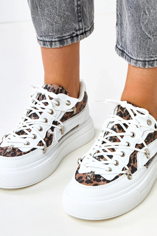 Zapatillas deportivas blancas con... Zapatillas deportivas blancas con...