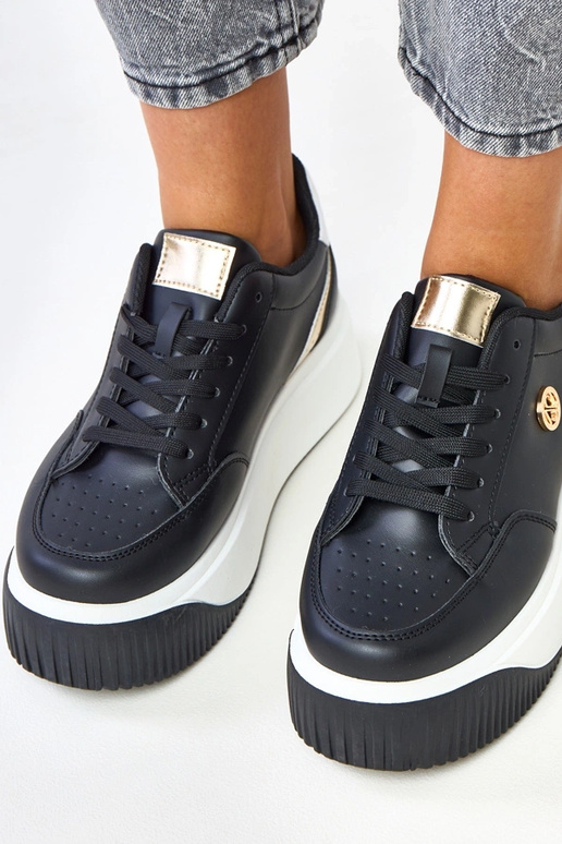 Zapatillas deportivas negras con... Zapatillas deportivas negras con...