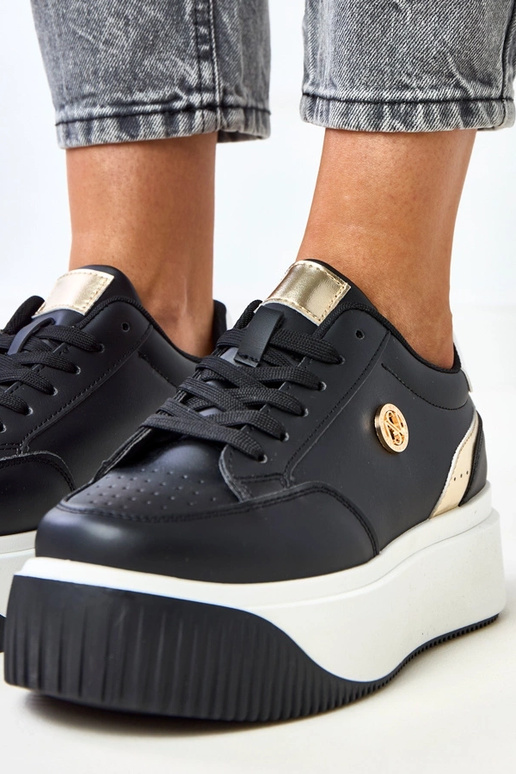 Zapatillas deportivas negras con... Zapatillas deportivas negras con...