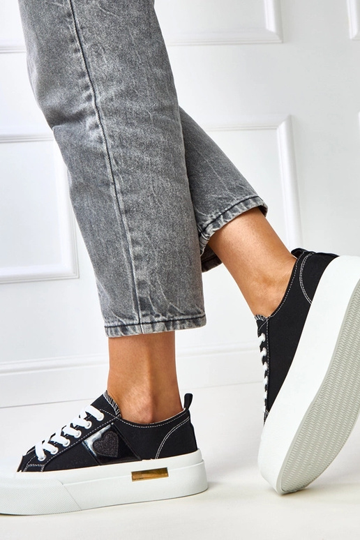 Zapatillas deportivas negras con... Zapatillas deportivas negras con...