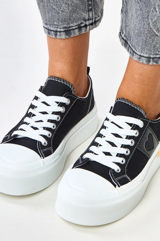 Zapatillas deportivas negras con... Zapatillas deportivas negras con...