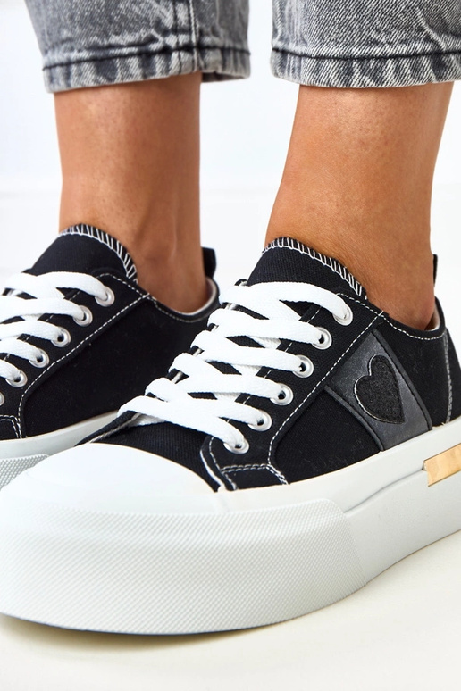 Zapatillas deportivas negras con... Zapatillas deportivas negras con...