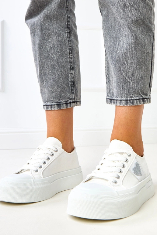 Zapatillas deportivas blancas con... Zapatillas deportivas blancas con...