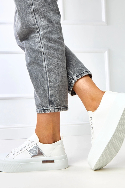 Zapatillas deportivas blancas con... Zapatillas deportivas blancas con...