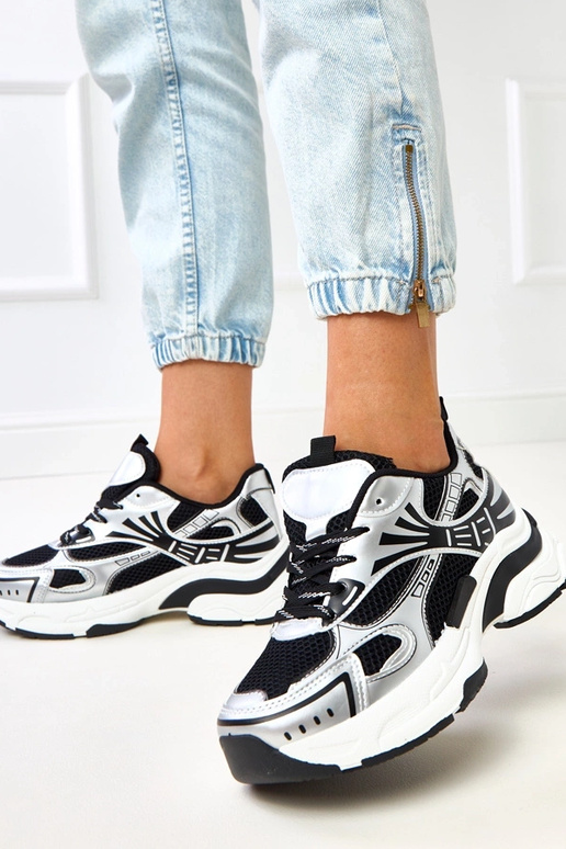 Zapatillas deportivas negras con... Zapatillas deportivas negras con...