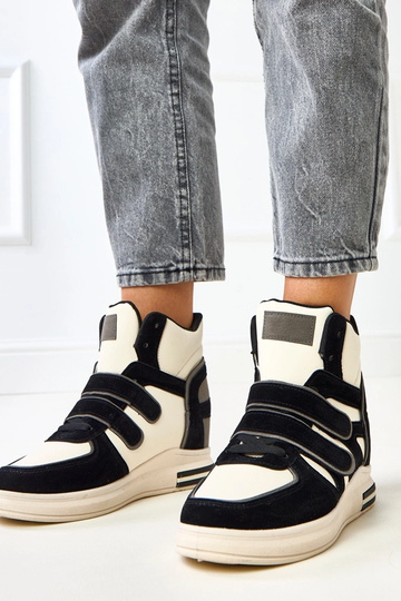 Botas altas en negro y blanco con plataforma oculta Ashni