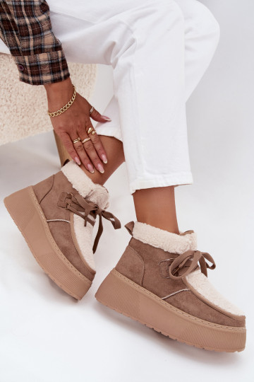 Botas de nieve Femenino con una plataforma con un abrigo de piel beige Florivelle