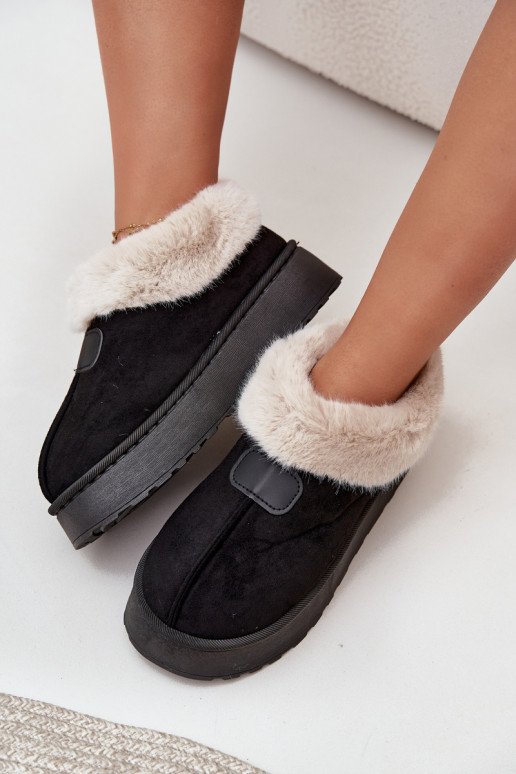 Botas de nieve Femenino con una plataforma con un abrigo de piel de color negro Calyra