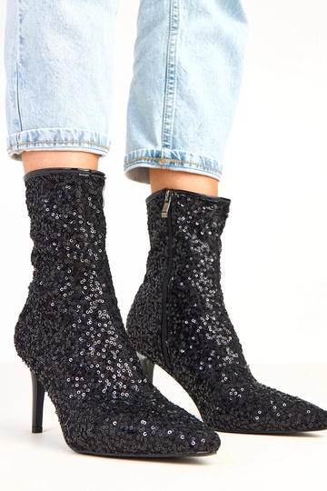 Botines negros con acabado...