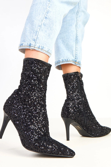 Botines negros con acabado... 2