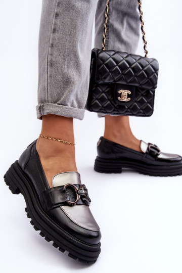 Botines de piel con suela maciza. de color negro Elkiza