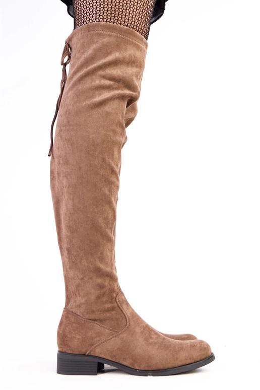 Botines largos color arena de suela...