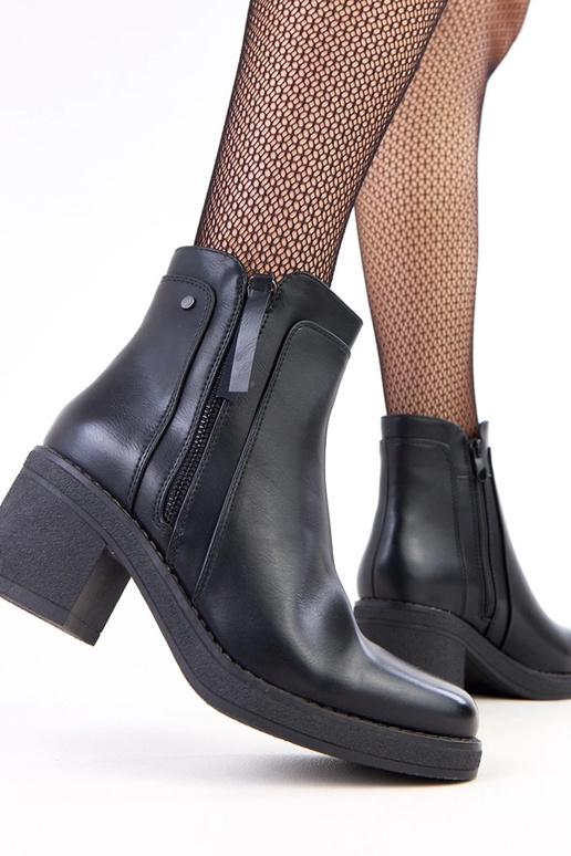 Botines negros con columna y...